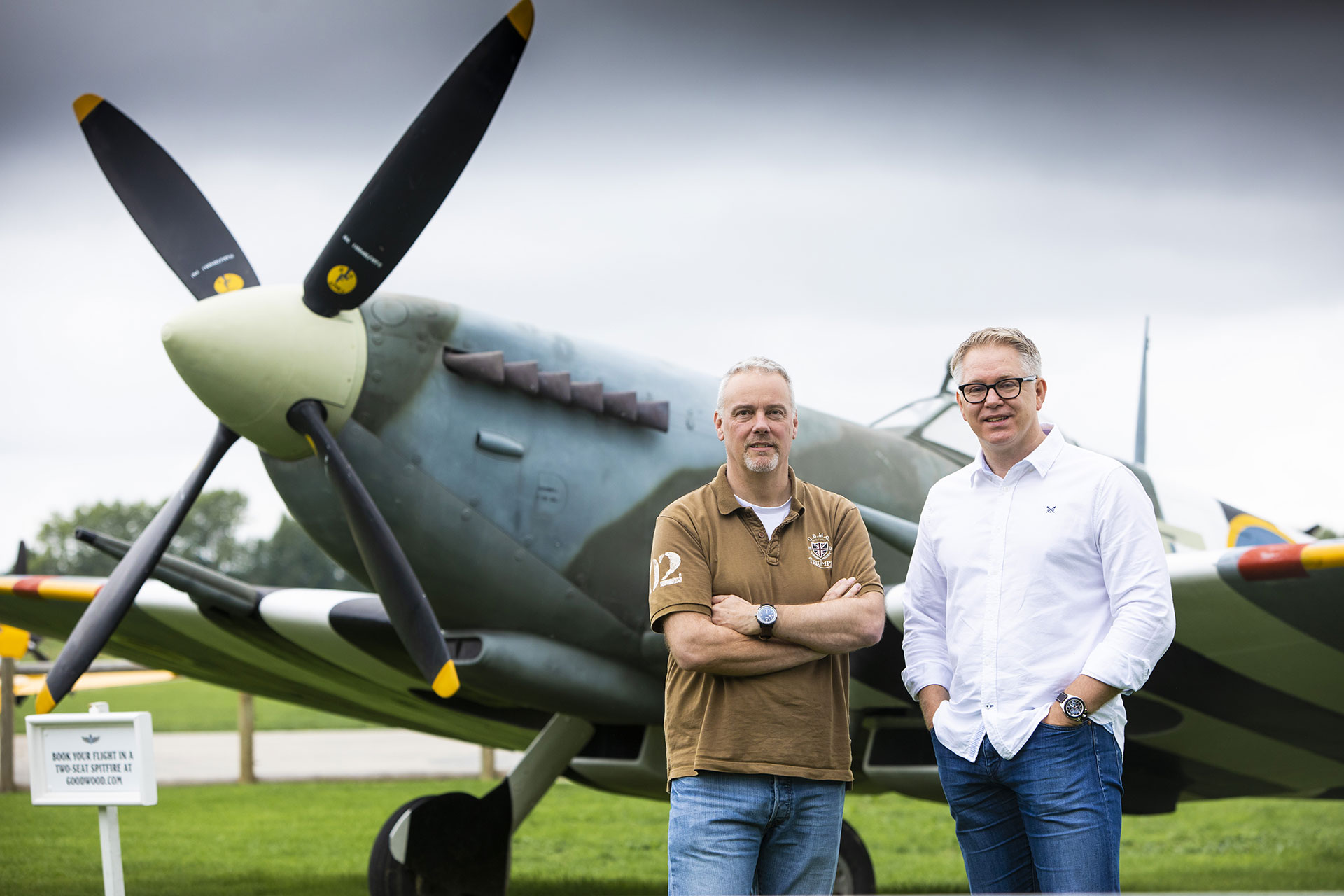Graham and Andrew standing beside spitfire