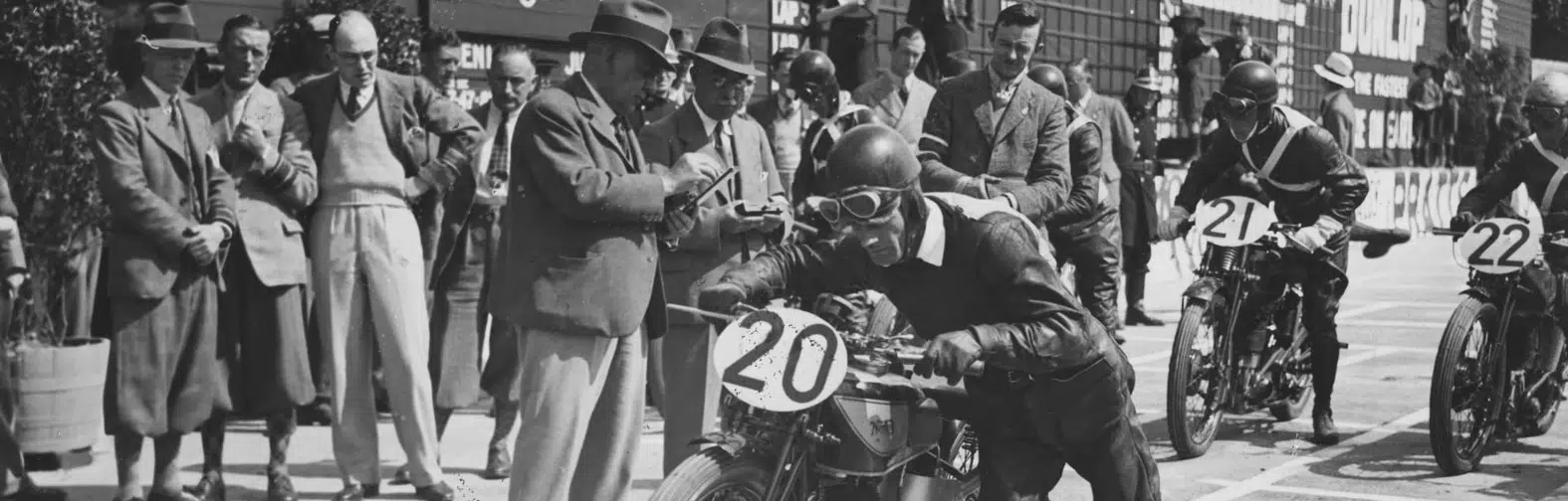Men on motorbikes about to race