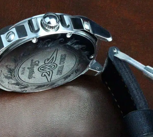 Leather strap being attached to L1 watch