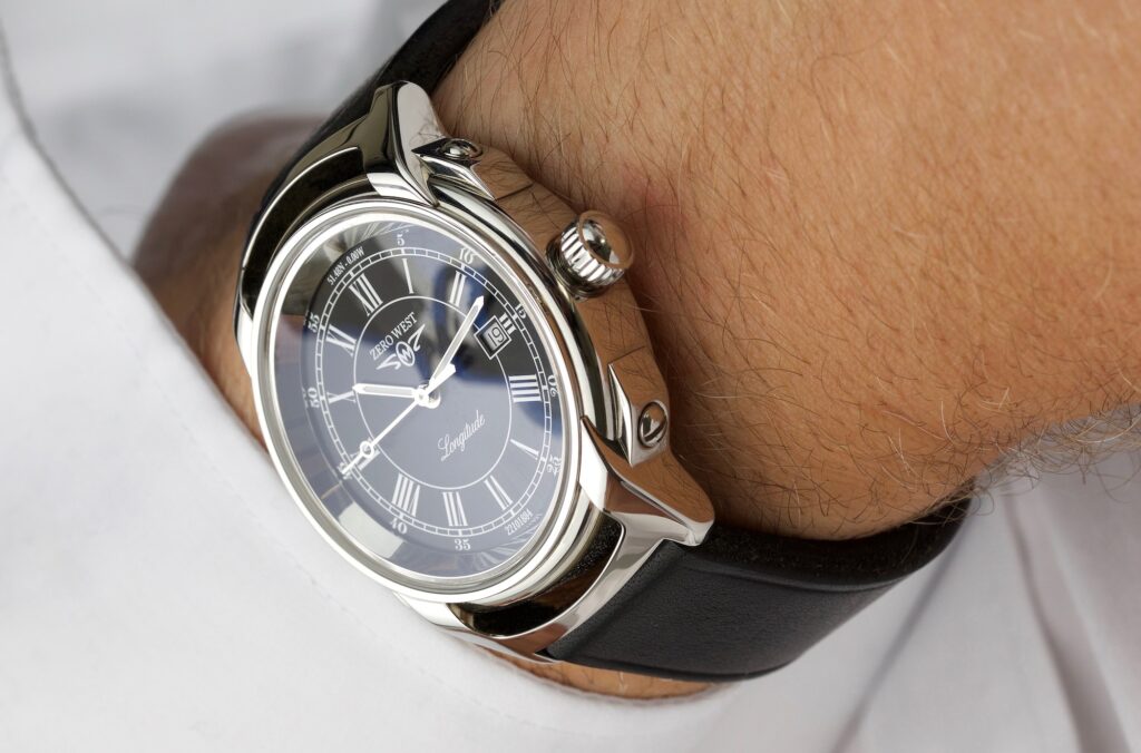 L2 Longitude watch on the wrist with white shirt