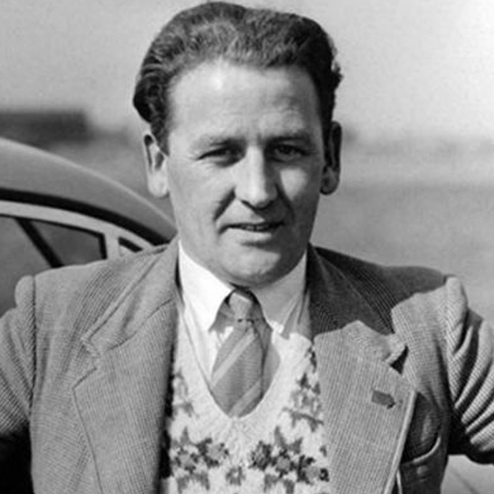 Black and white photo of Norman Dewis