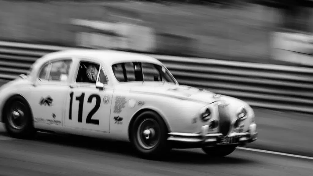 Black and white picture jaguar car racing