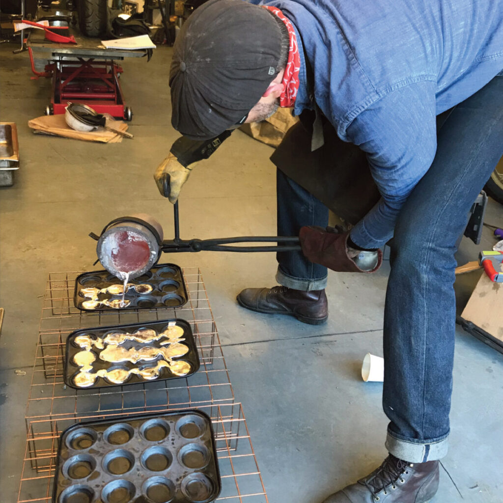 Man pouring smelted metal