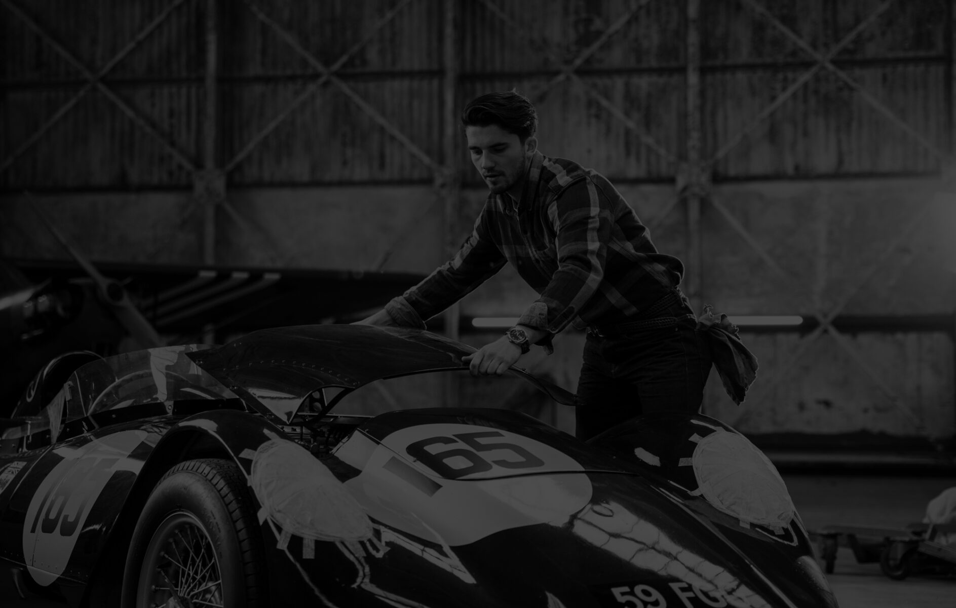Man with jaguar car