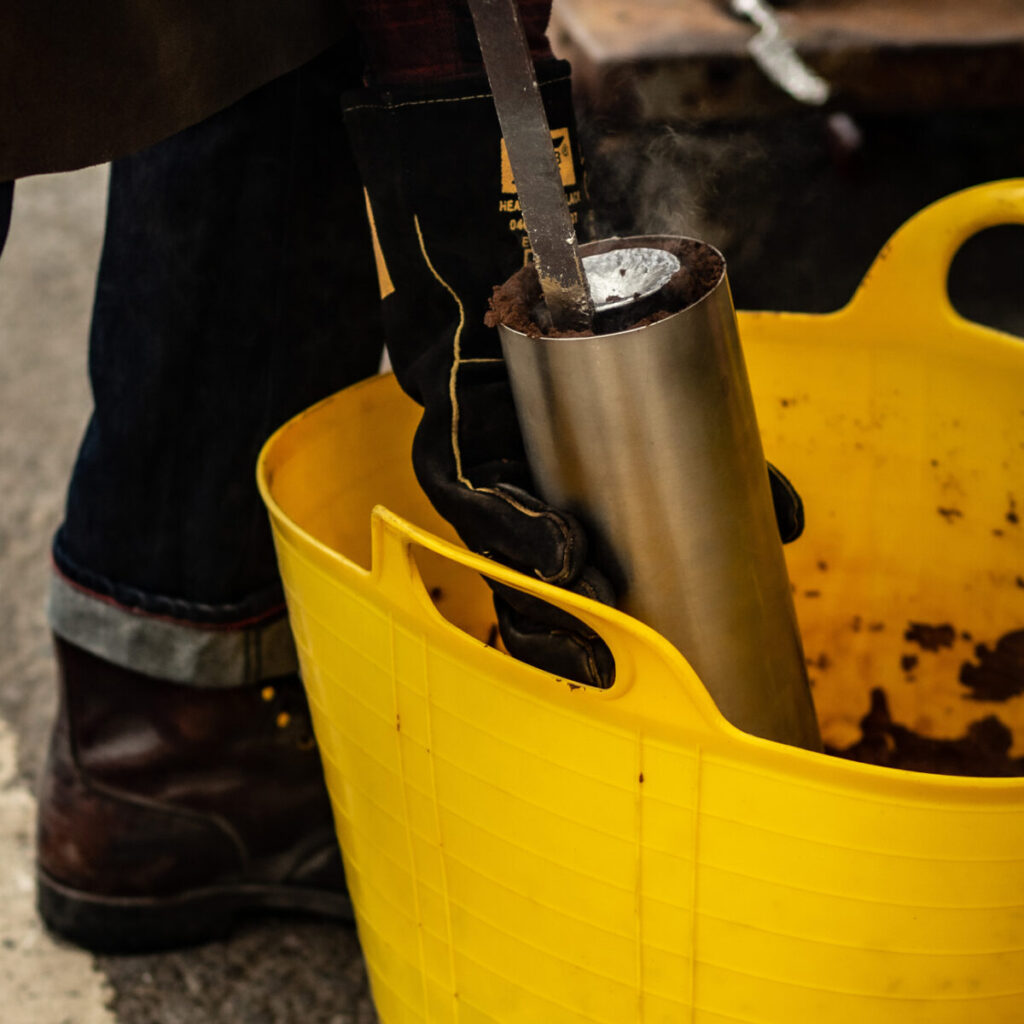 Yellow bucket with metal tube in