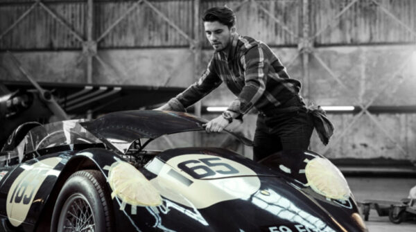 Man working on classic racing car