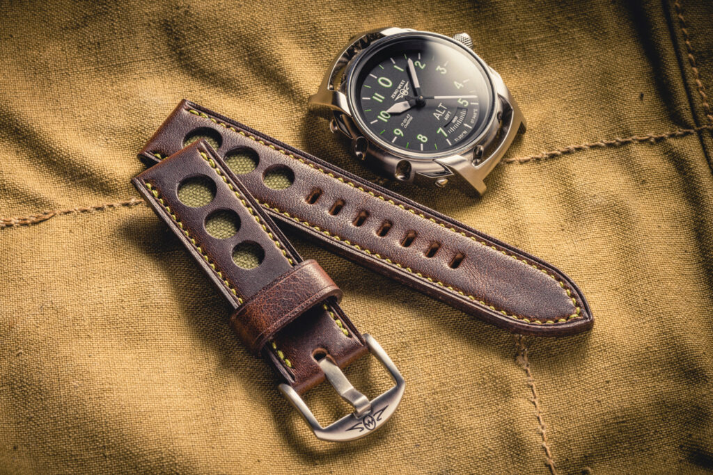 DB1 watch with nutbrown leather strap with green stitching and inset green canvas