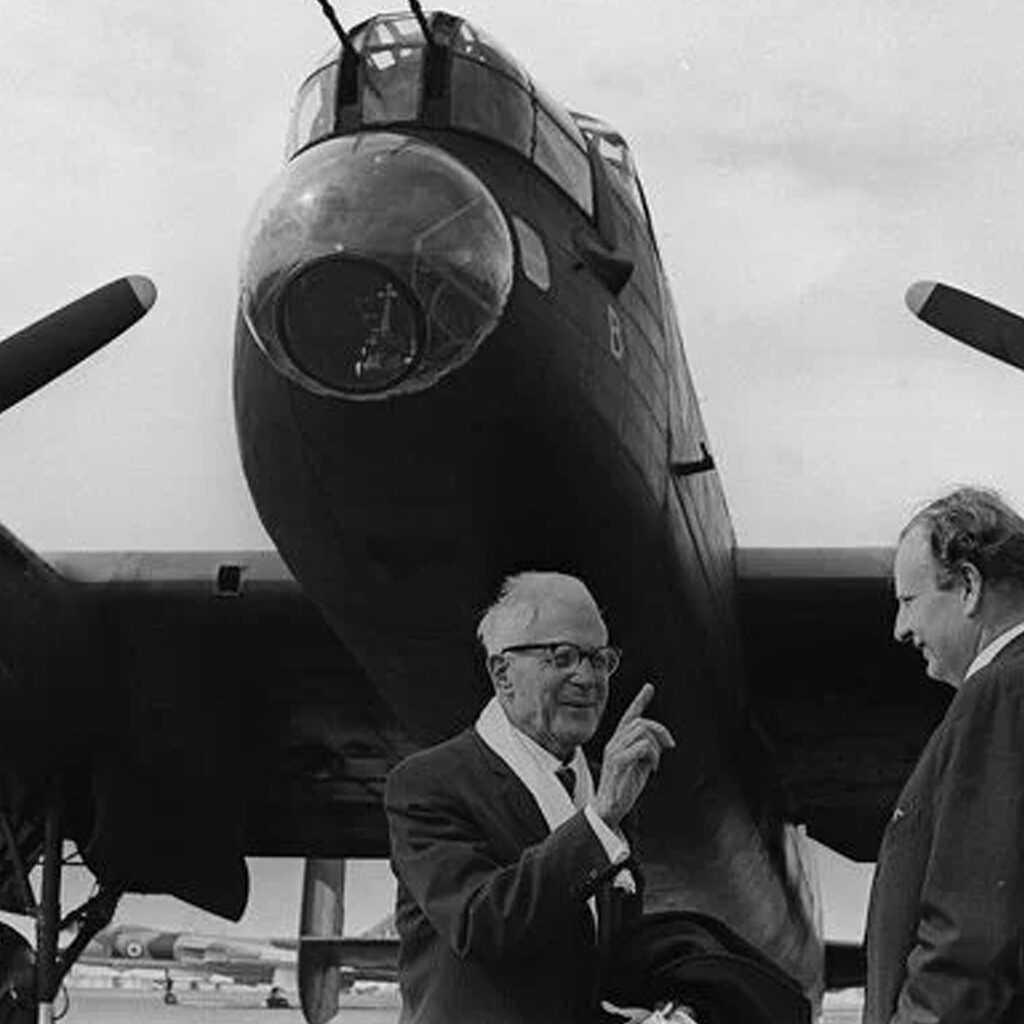 Lancaster bomber with Sir Barnes Wallis standing in front
