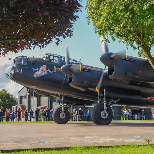 Just Jane Lancaster plane on display outside with crowds watching