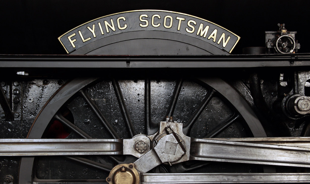 Close up of Flying Scotsman wheel with name plate above