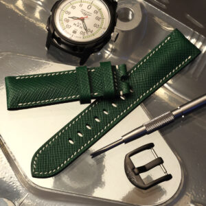 Green padded strap with FS-1 watch and strap tool