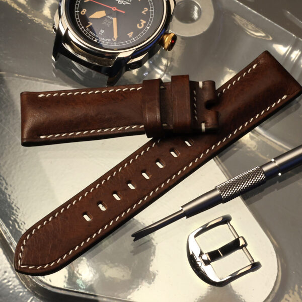 Brown padded strap with S2 watch and strap tool