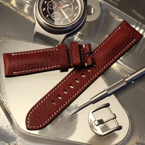 Red padded strap with LS-2 watch and strap tool