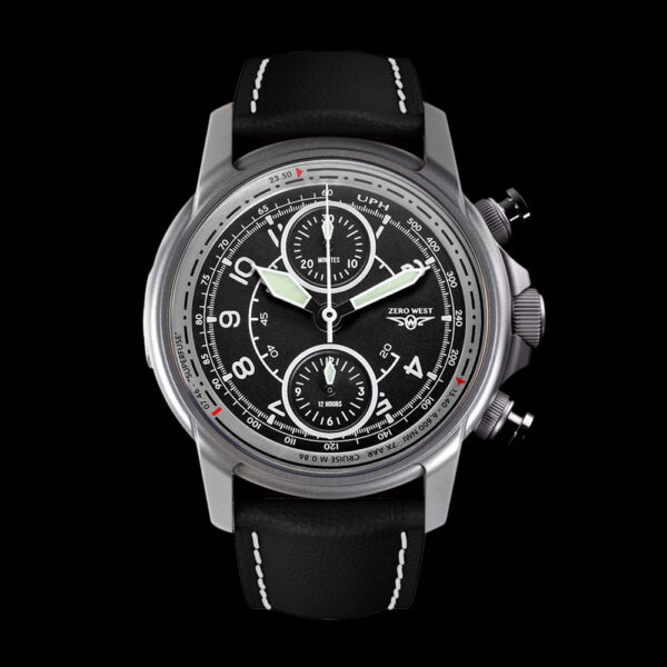Front on shot of the AV1 Vulcan Pilots watch containing metal from falklands war bomber plane XM607 with black leather padded strap on a solid black backdrop