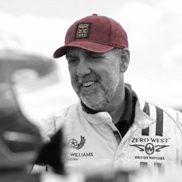 Red Waxed Cap on motorsport racing drive Grant Williams to showcase Merchandise by British Watchmaker - Zero West