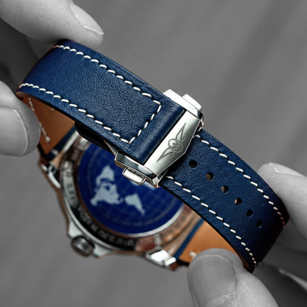 Zero West embossed butterfly clasp on a blue handcrafted leather padded watch strap. Fitted on a Longitude land & travel watch by Zero West